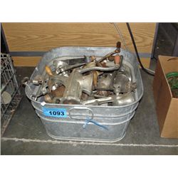 Galvanized laundry pail filled with assorted meat