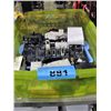 Image 1 : Green plastic bin of assorted fuse box electrical