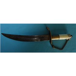 Antique Dagger: Handle in bone, carved lion head. Hilt is brass with 2 lion heads. 7 ¼” long. Probab