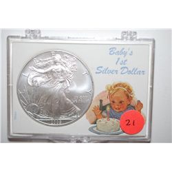 2009 Silver Eagle $1 In Baby's 1st Silver Dollar Holder; EST. $35-45