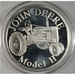 CLASSIC JOHN DEERE LICENSED ONE OUNCE SILVER ROUND FEATURING A MODEL H TRACTOR