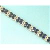 Image 1 : 18K GOLD RUBY AND DIAMOND BRACELET