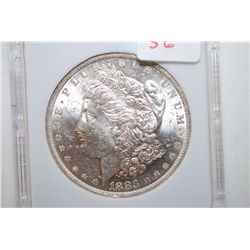 1883-O Silver Morgan $1; MCPCG Graded MS63; EST. $60-80