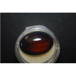 Large Oval-Shaped Brown/Orange Gemstone; EST. $10-20