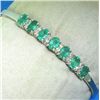Image 1 : 14K BANGLE WITH EMERALDS & DIAMONDS
