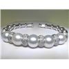 Image 1 : 18K PEARL AND DIAMOND BANGLE