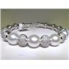 Image 1 : 18K PEARL AND DIAMOND BANGLE