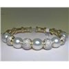 Image 1 : 18K PEARL AND DIAMOND BANGLE