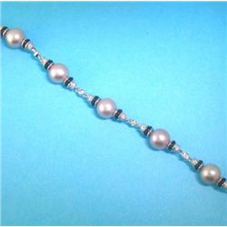 18K GOLD PEARL AND DIAMOND BRACELET