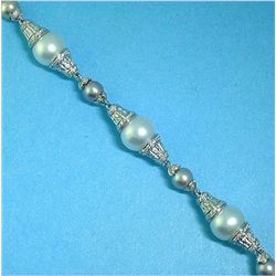 18K GOLD PEARL AND DIAMOND BRACELET