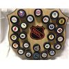Image 3 : WOODEN DISPLAY OF 25 NHL TEAM PUCKS