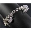 Image 1 : 2445 - STERLING SILVER BRACELET W/ 13 STERLING SILVER CHARMS