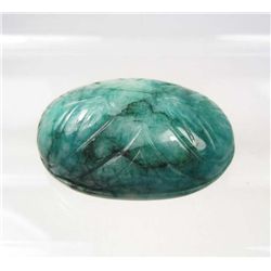 8853 - 124.4 CT CARVED EMERALD