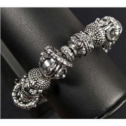 4897 - SILVER TONE STRETCH BRACELET W/ STARS, BUTTERFLIES  AND MORE