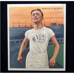 5731 - 1910 MECCA CIGARETTES TRADE CARD - HAROLD A. WILSON MILE RUNNER CHAMPION