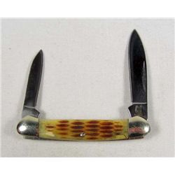 9232 - ROUGH RIDER MINI CANOE POCKET KNIFE W/ AMBER JIGGED BONE HANDLE