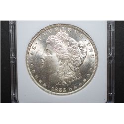 1885-O US Silver Morgan $1; MCPCG Graded MS62; EST. $45-55
