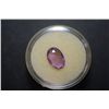 Image 1 : Oval-Shaped Purple Gemstone;  EST. $5-10