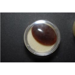 Large Oval-Shaped Brown Gemstone; EST. $10-40