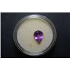 Image 1 : Teardrop Shaped Purple Gemstone; EST. $10-25