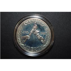 1988-S US Olympiad Commemorative Silver $1 Proof In Velvet Box With COA Included; .900 Silver .8594 
