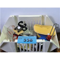 Small white plastic basket filled with assorted