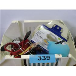 Small white plastic basket filled with assorted