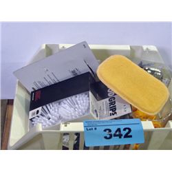 Small white plastic basket filled with assorted