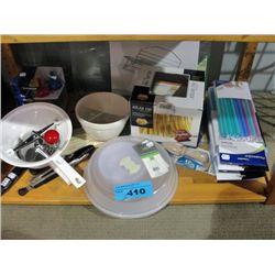 One shelf lot of assorted new kitchen tools and
