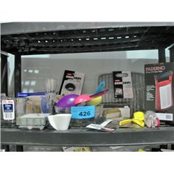 One shelf lot of new assorted kitchen tools and