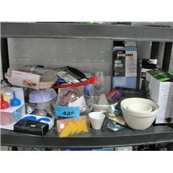 One shelf lot of new assorted kitchen tools and