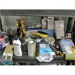 One shelf lot of new assorted kitchen tools and