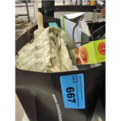 Brown store bag filled with new assorted kitchen