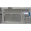 Image 1 : New GE off white space maker built in microwave