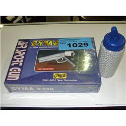 P638 airsoft gun with one container of BBs