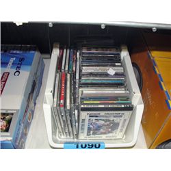 White plastic basket of assorted music CDs