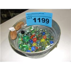 Tin full of assorted marbles