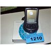 Image 1 : Plantronics and a palm pilot