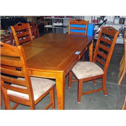 Dining room table with one leaf and 4 chairs