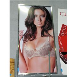 Large female model advertisement poster
