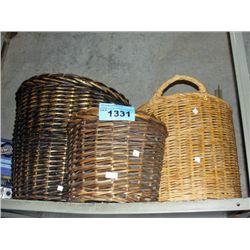 Lot of 4 assorted size wicker baskets