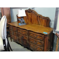 9 drawer serpantine front oak dresser with