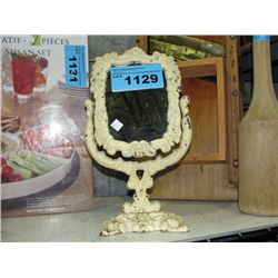 Heavy cast metal framed dresser mirror