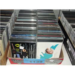 One box of assorted music CDs