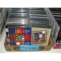 One box of assorted music CDs