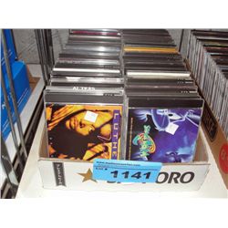 One box of assorted music CDs