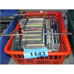 One grocery basket of assorted music CDs