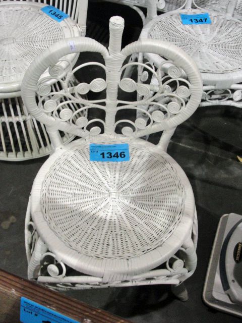 White wicker heart shaped back patio chair
