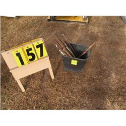 Tub of metal stakes