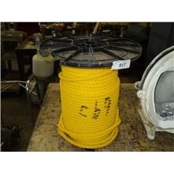 PARTIAL SPOOL OF YELLOW NYLON ROPE